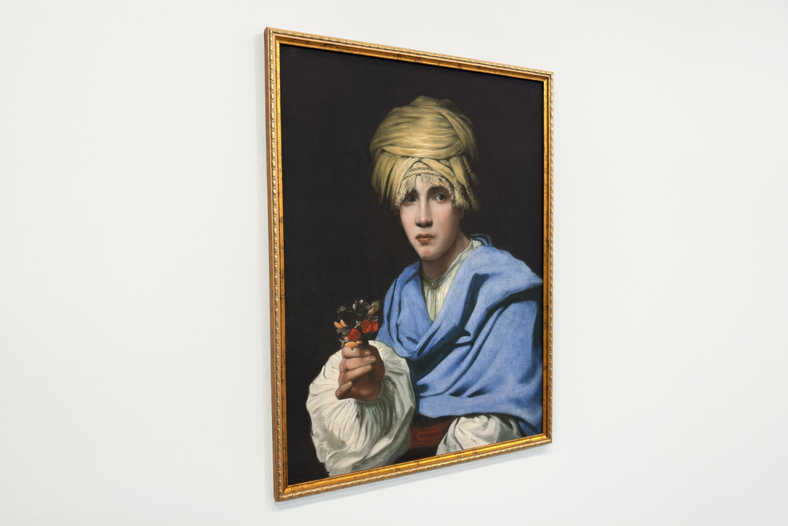 Niño con turbante sosteniendo un ramillete - Michiel Sweerts
