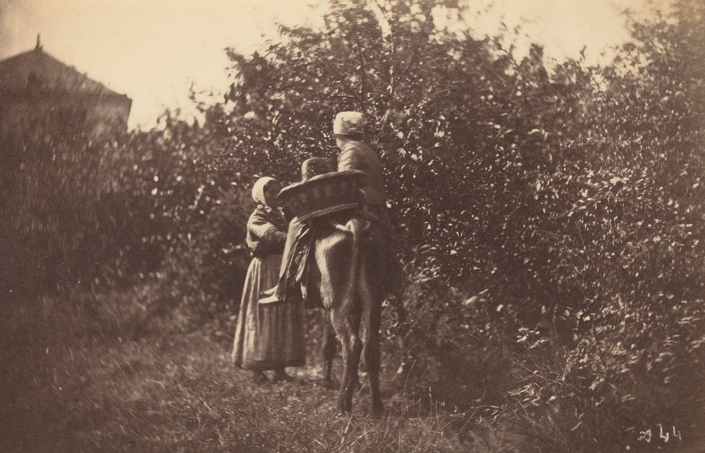 Dos Mujeres con Burro de Auguste Giraudon