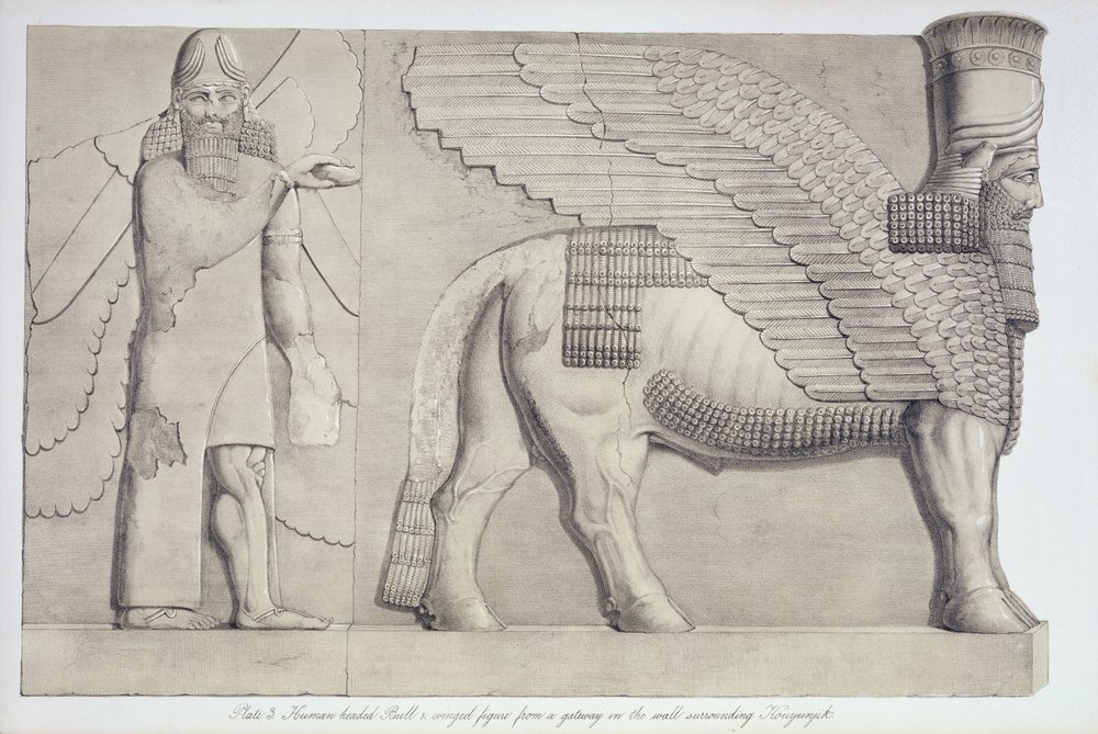 Toro con cabeza humana y figura alada de una puerta en la muralla que ...