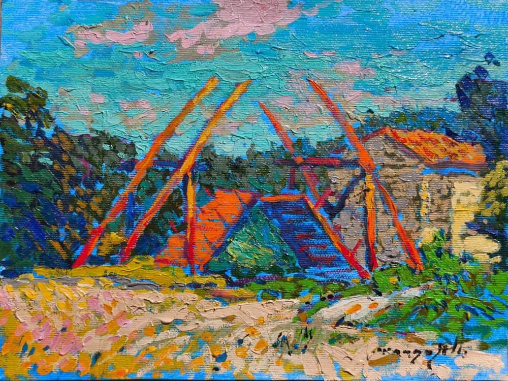 Un molino de viento rural lleno de vida de Alexander Shandor