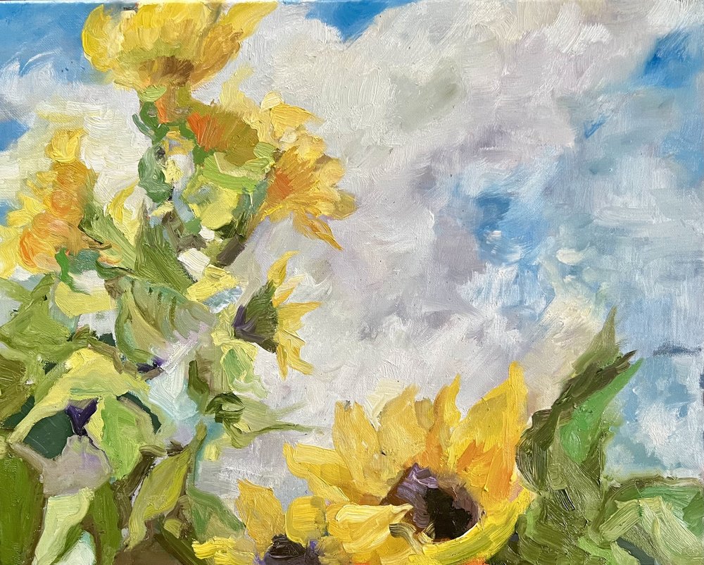 Girasoles y cielo azul de Alexandra Higgins