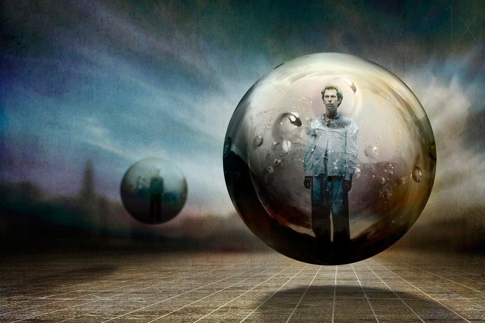 Hombre dentro de una esfera flotante de Ben Goossens ✝