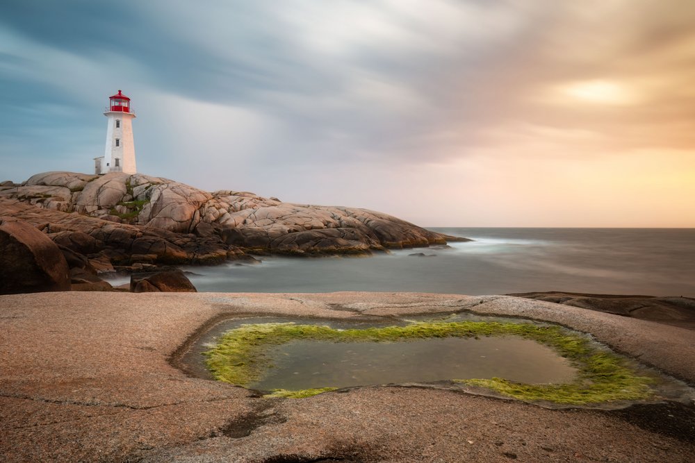 Puesta de sol en un faro costero de Christoph Schaarschmidt