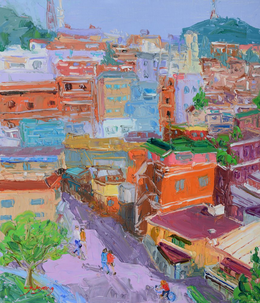 Una ciudad llena de vida en la ladera de Jukyong Park