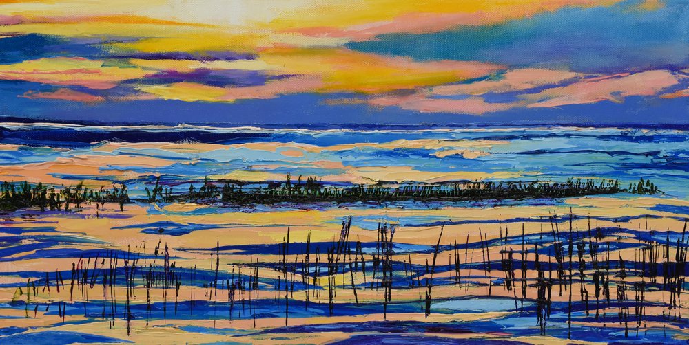 Una vibrante puesta de sol en el pantano de Maxine Shore