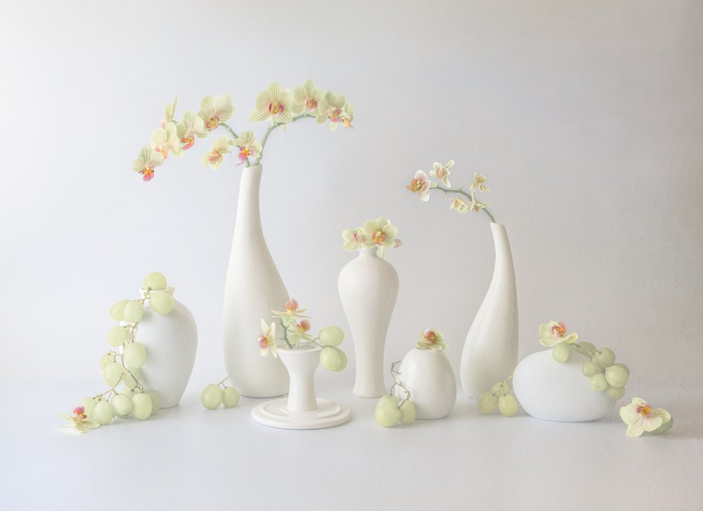 Arreglo floral de orquídeas sereno de May G