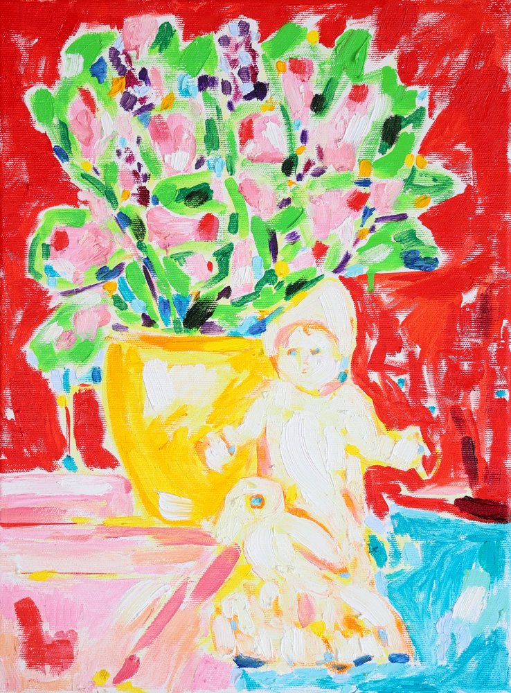 Flores de vivos colores y una muñeca de Tamara Jare