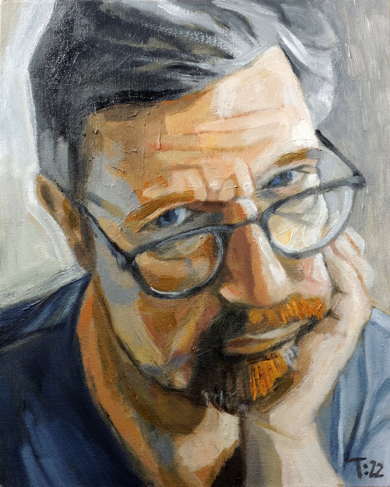 Hombre pensativo con gafas de Tore Bahnson