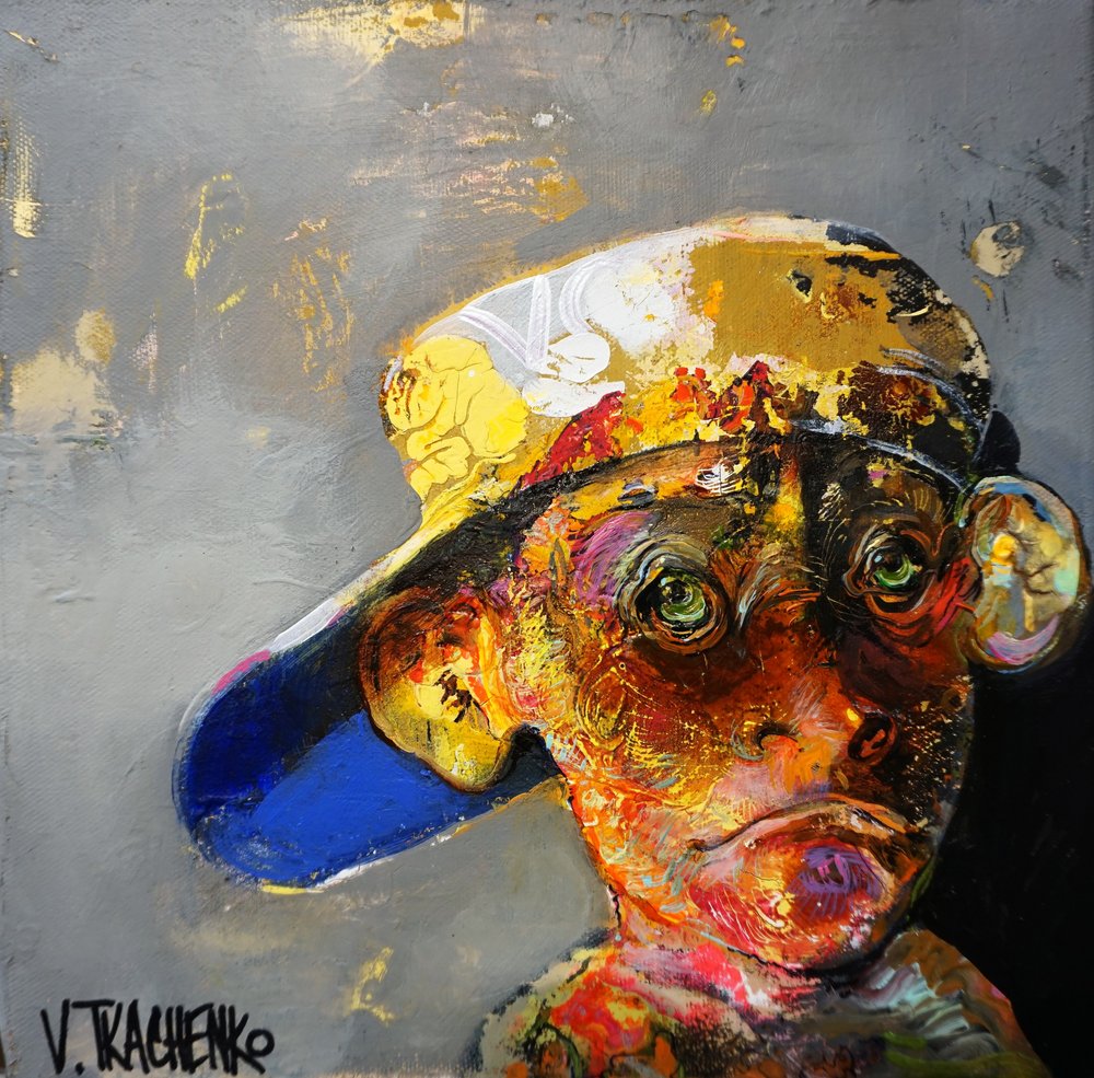 Mono de colores con gorra de Victor Tkachenko