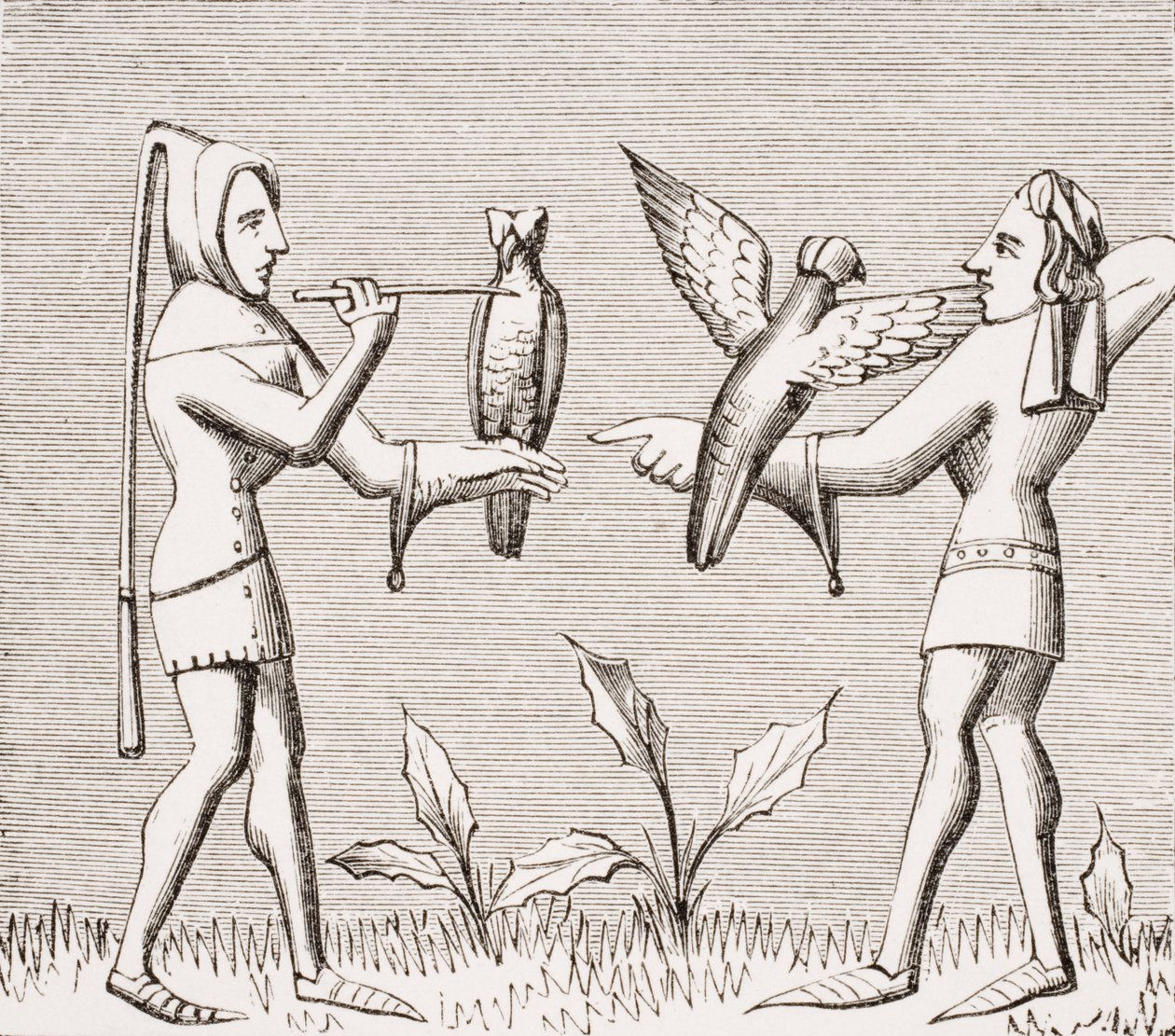 Halconeros vistiendo a sus aves, reproducción de una miniatura en el manuscrito del siglo XIV 