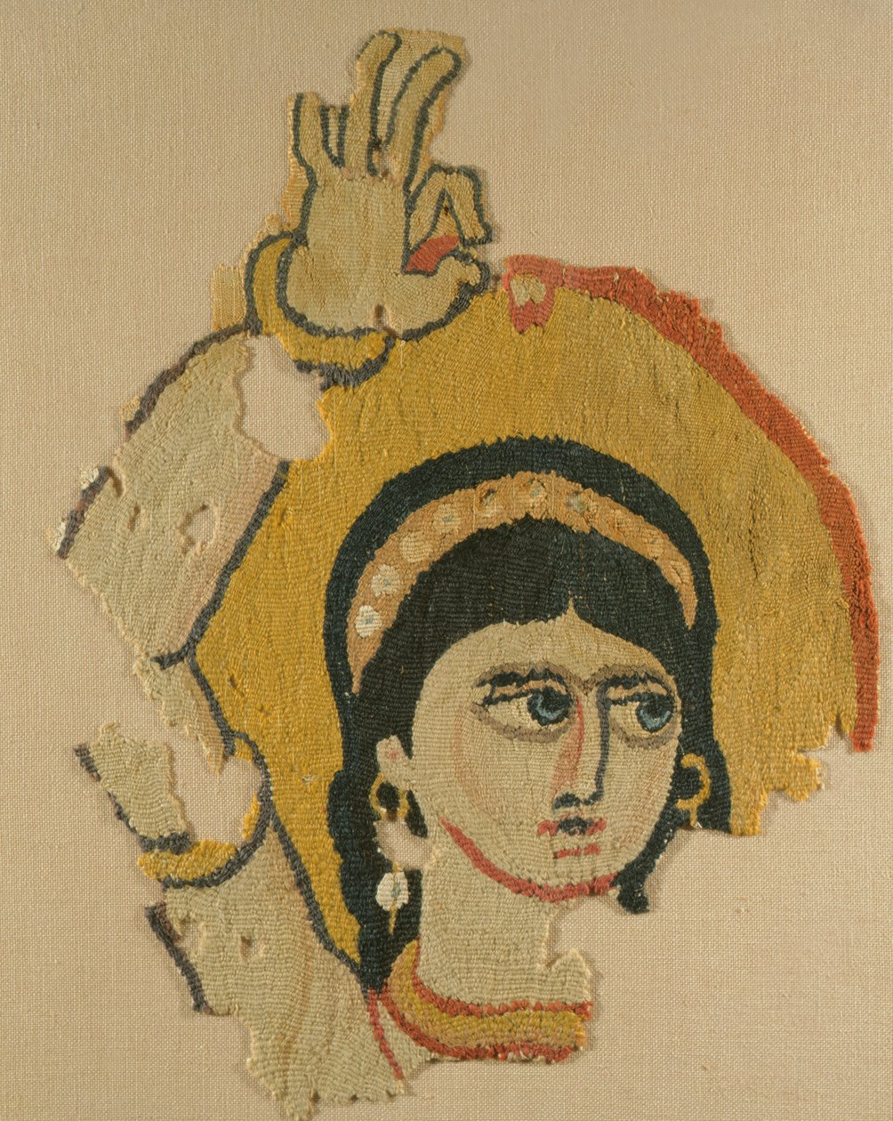 Cabeza de una bailarina, tapiz de Coptic