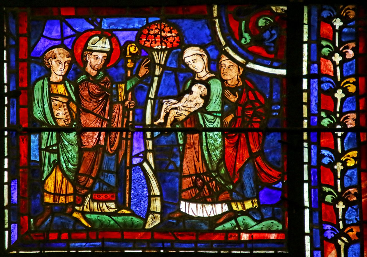San Martín reviviendo a un niño, de la Vida de San Martín, Catedral de Chartres de French School