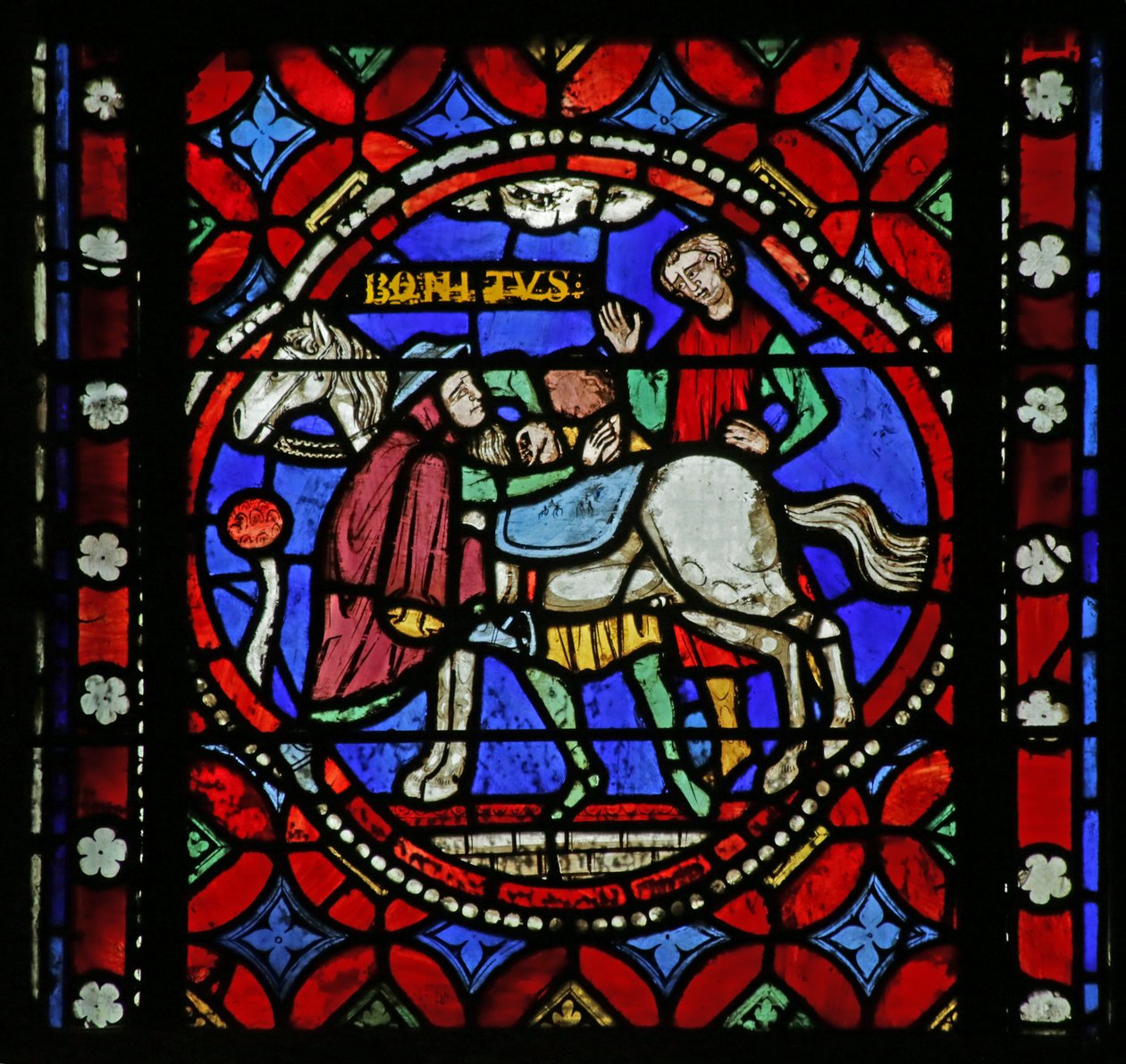 Vidriera que representa una escena de la vida de San Bonnet: el santo recogiendo y montando su caballo para una peregrinación a Roma de French School