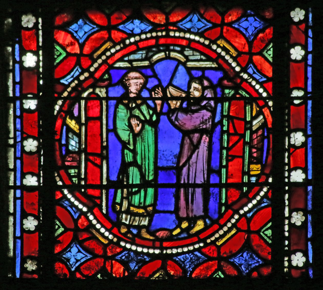Vidriera que representa una escena de la vida de San Bonnet: el santo en el viaje a Roma recibiendo refrescos del abad del monasterio en la Isla Barbe de French School