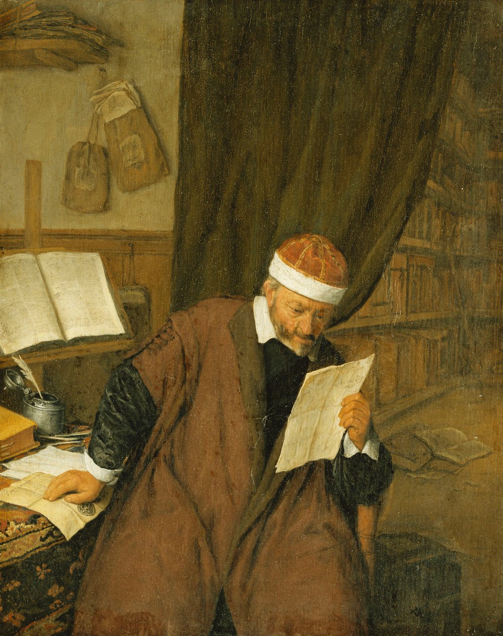 Un abogado sentado en un escritorio leyendo una carta, una biblioteca al fondo, 1668 de Adriaen Jansz. van Ostade