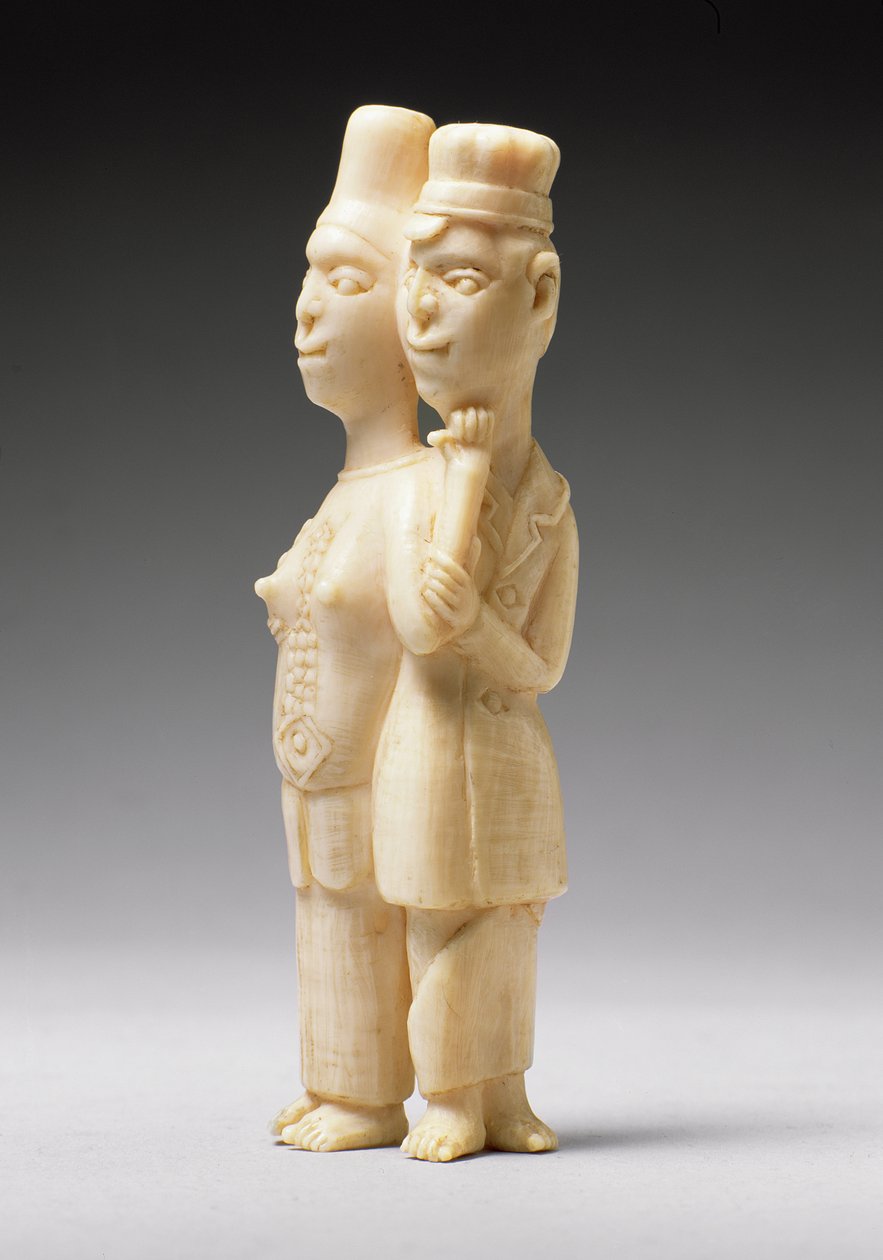 Figuras de un hombre con vestimenta europea y una mujer africana, Congo de African