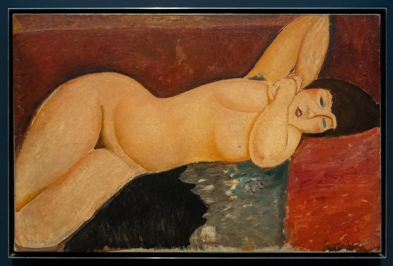 Desnudo femenino recostado con las manos entrelazadas de Amedeo Modigliani