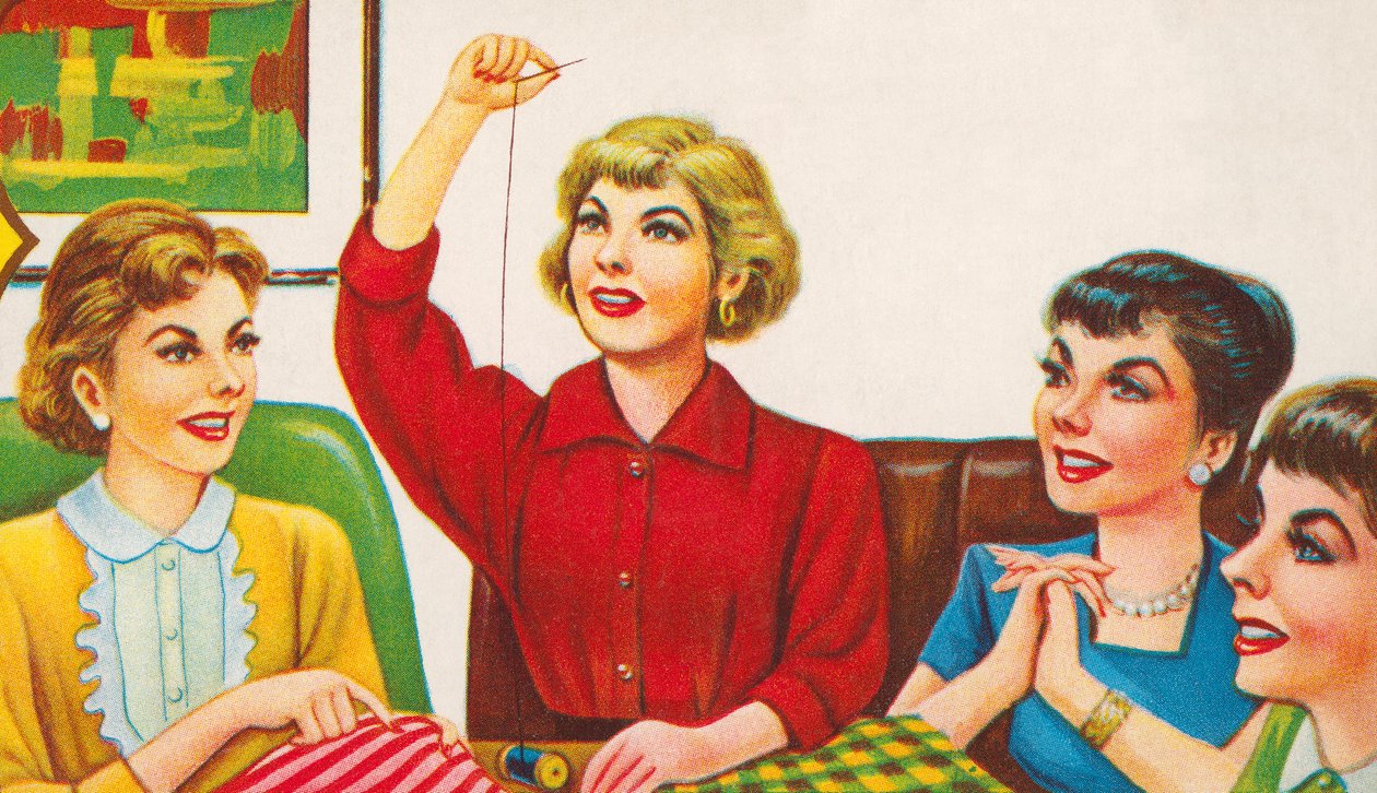 Mujeres en un círculo de costura de American School