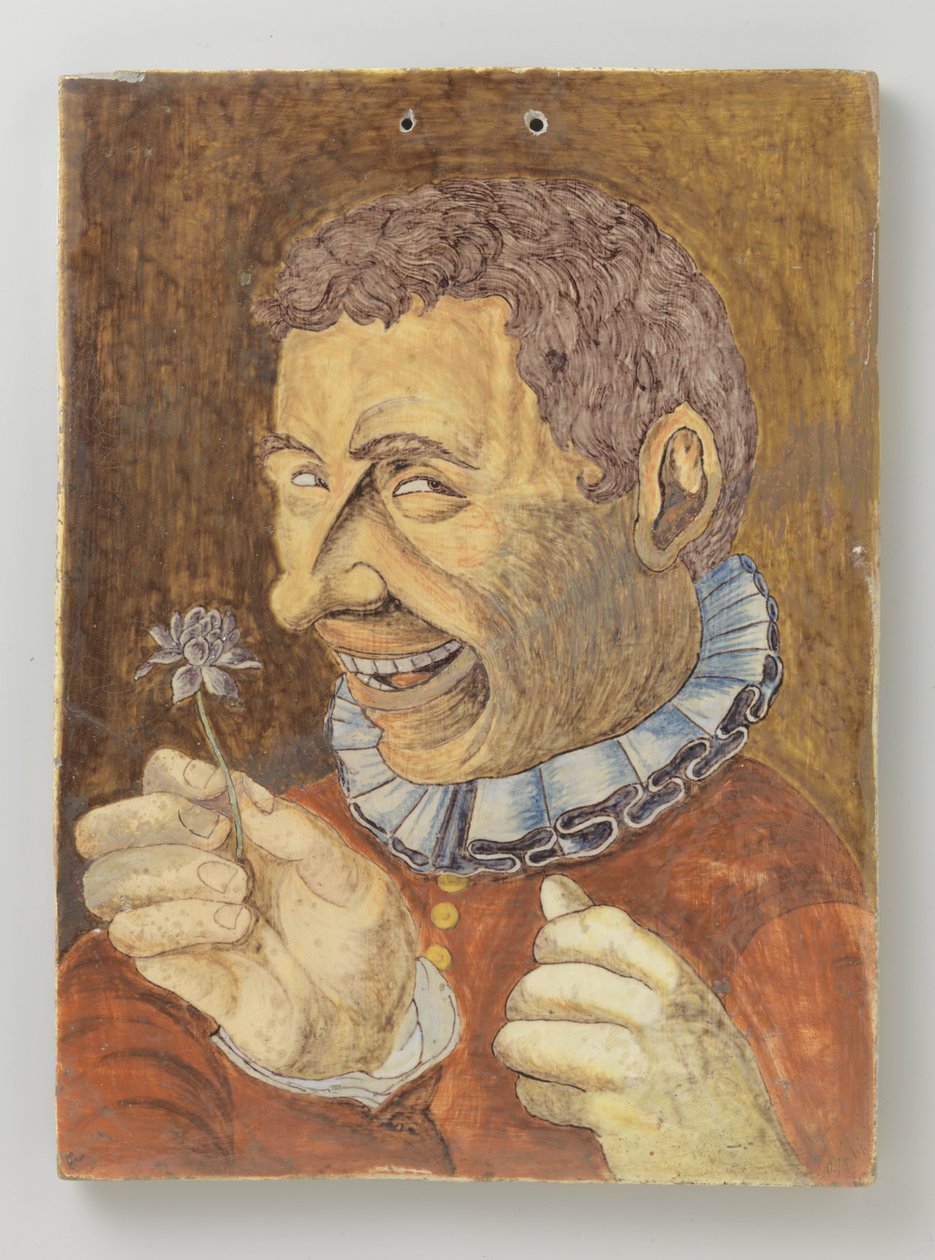 plato de loza con hombre con flor de Anonymous