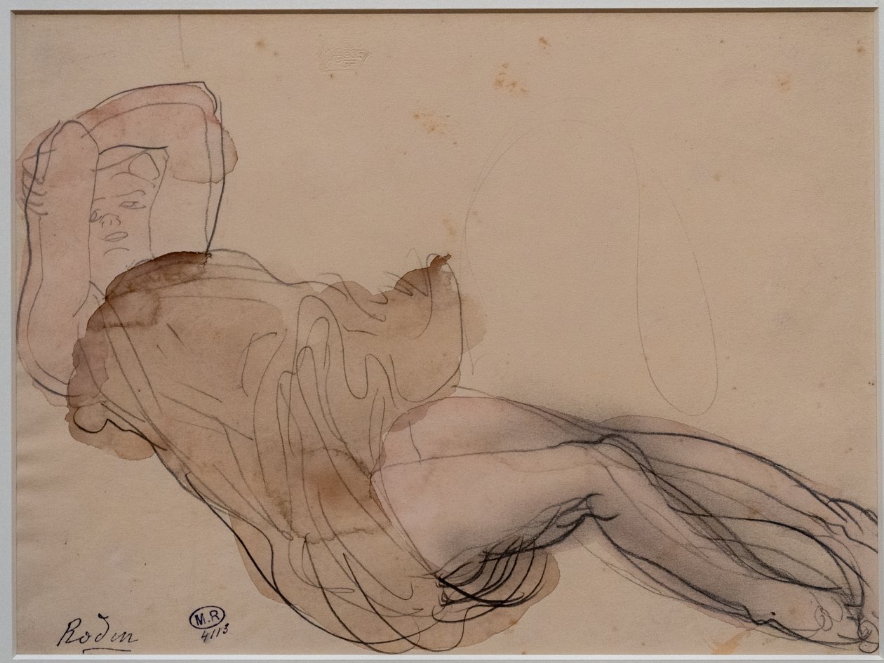 Mujer tumbada, semidesnuda y con los brazos cruzados detrás de la cabeza de Auguste Rodin