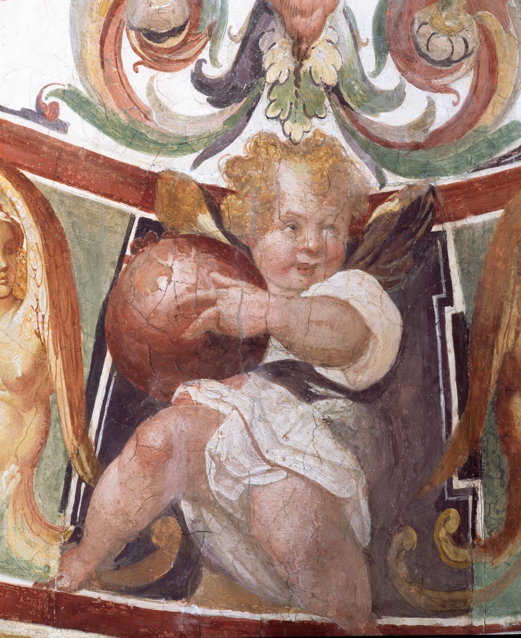 El Studiolo de Francesco de Medici (detalle de la decoración que representa un putto sosteniendo un globo) de Bartolomeo Ammannati