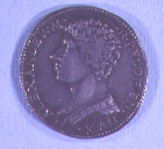 Moneda decorada con la cabeza de Alessandro de