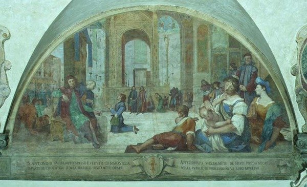 El joven San Antonio rezando ante el crucifijo en la plaza del pueblo de Bernardino Barbatelli Poccetti
