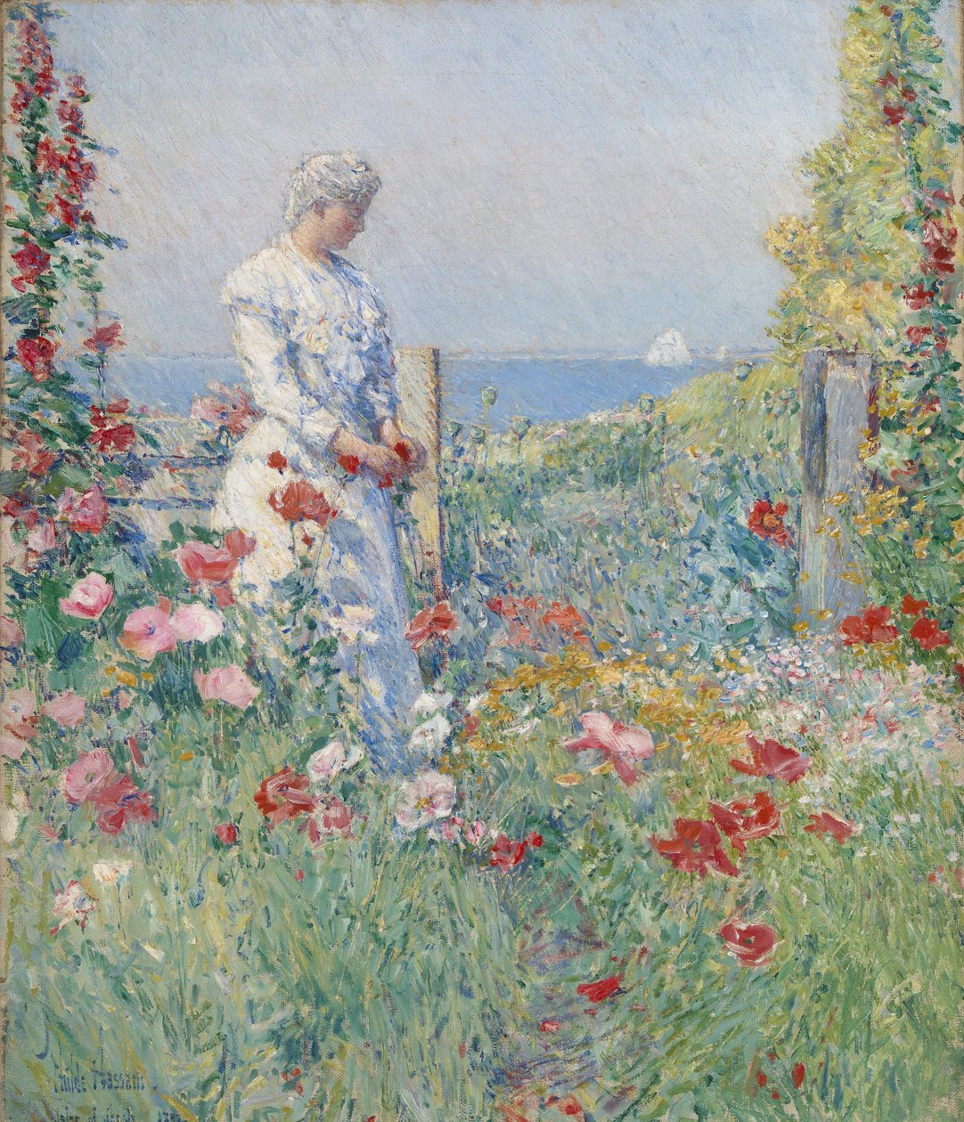 En el jardín (Celia Thaxter en su jardín) de Childe Hassam