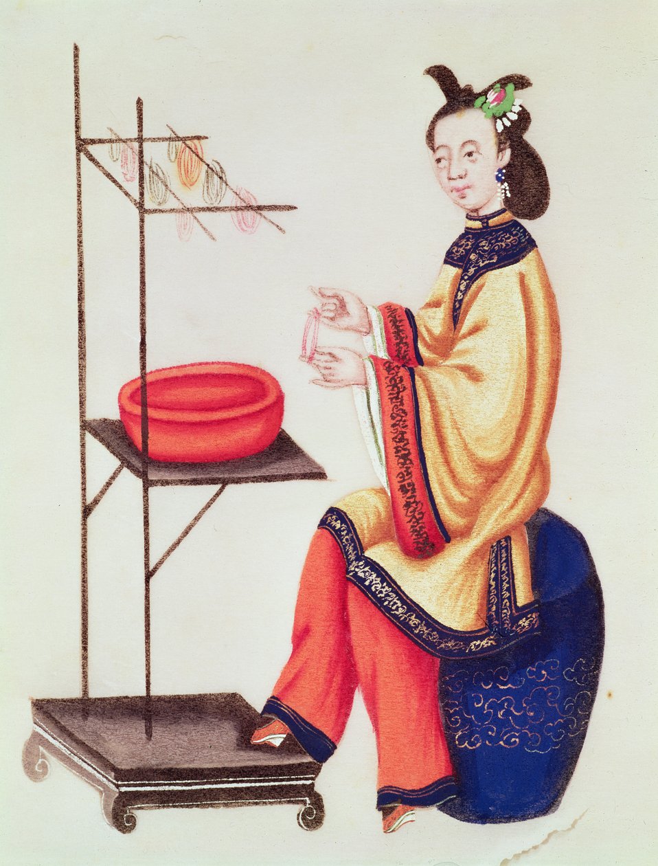Una mujer china haciendo un carrete, período Qianlong (1736-96) de Chinese School