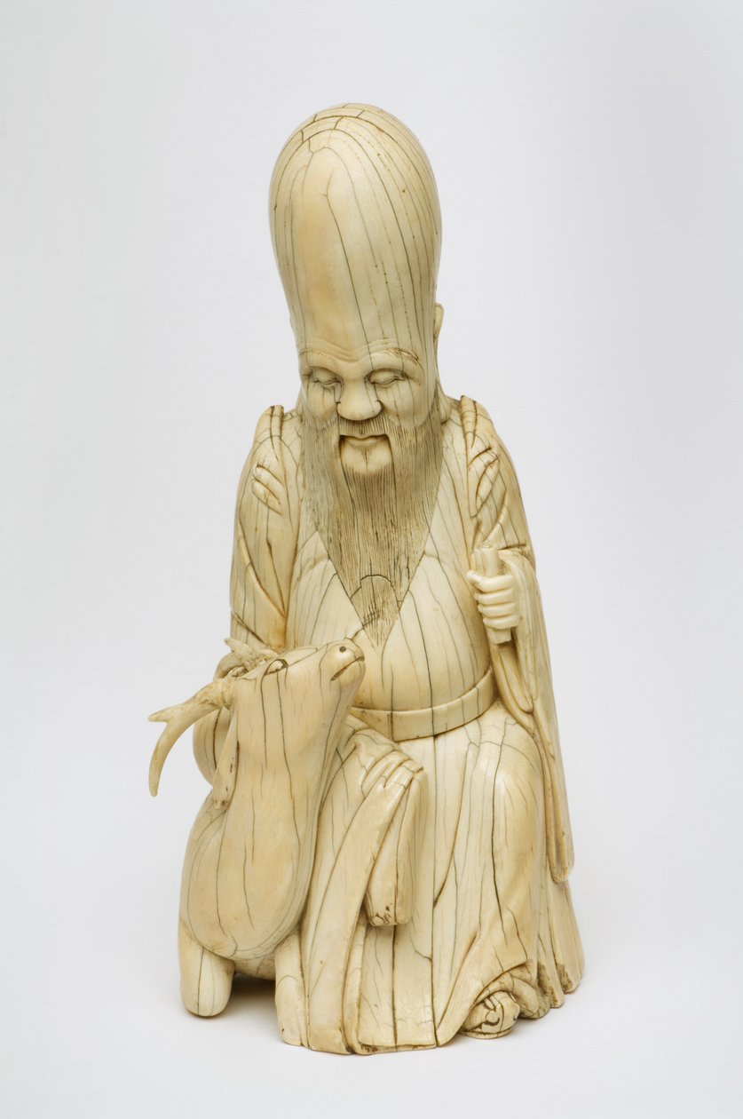 Figura de marfil tallada de Shou Xing sentado con un ciervo, c.1580-1644 de Chinese School