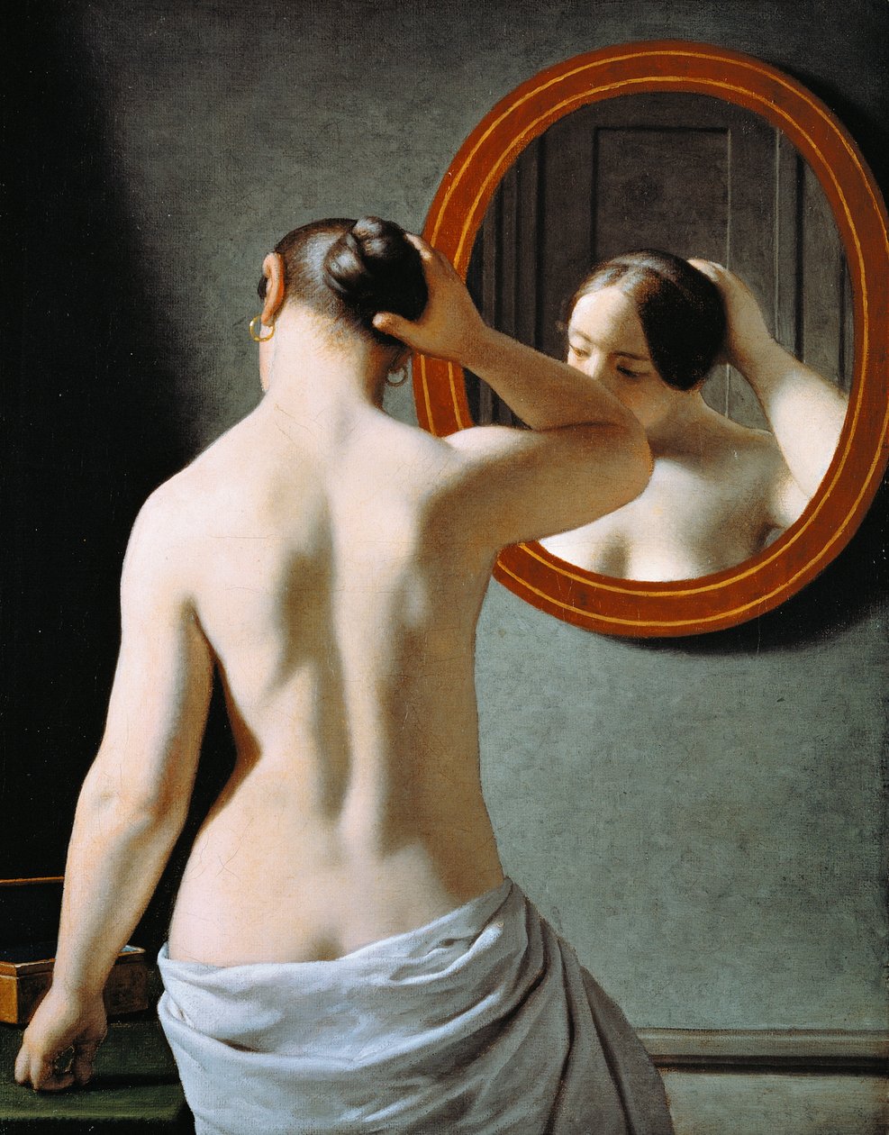 Una mujer desnuda peinándose frente a un espejo de Christoffer Wilhelm Eckersberg