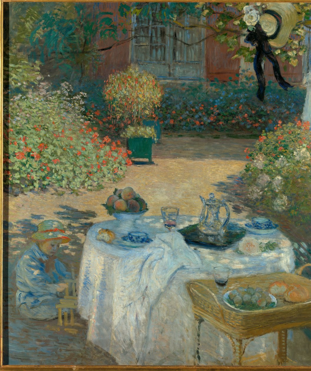 Almuerzo en el jardín de Monet en Argenteuil de Claude Monet