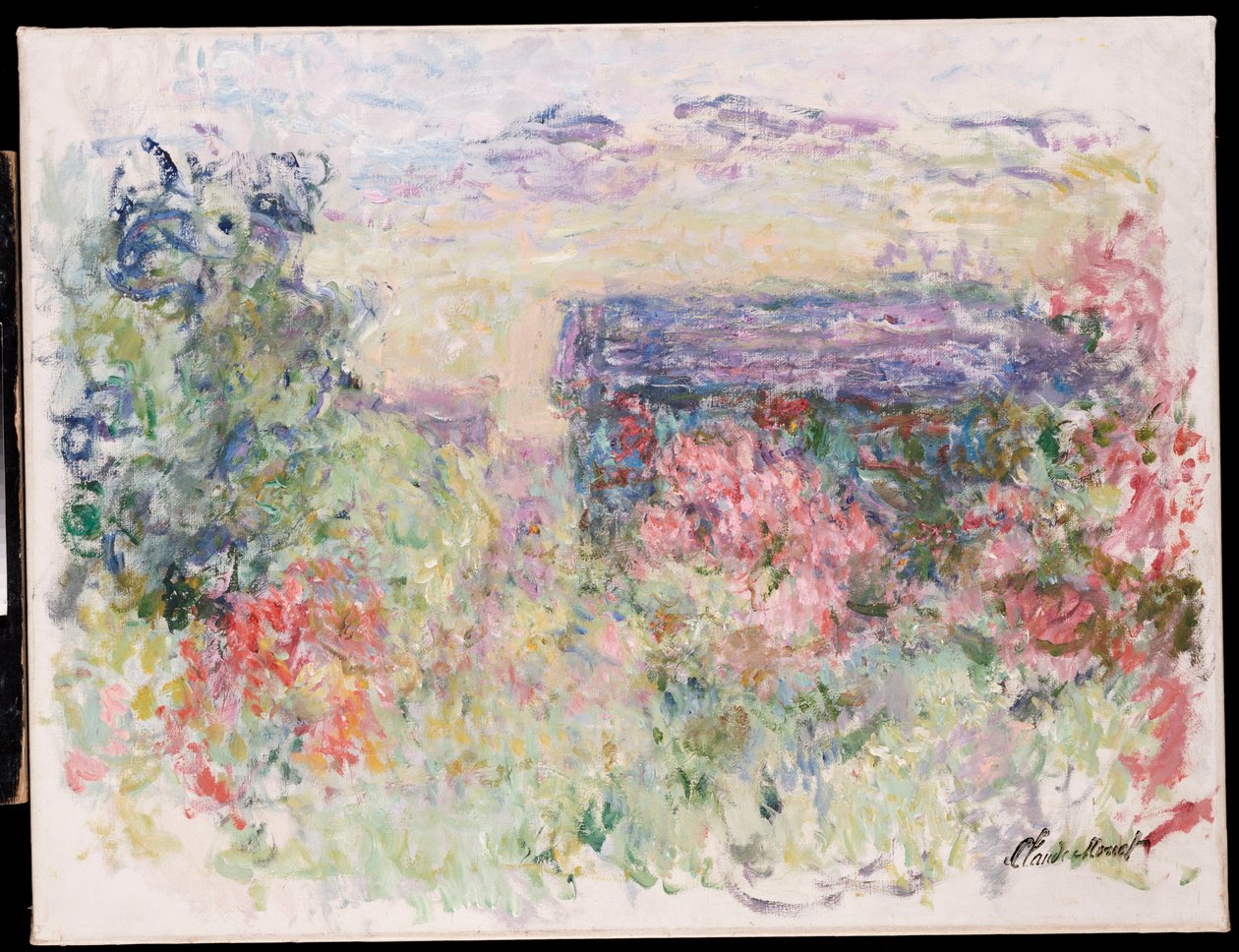 La casa a través de las rosas, c.1925-26 de Claude Monet