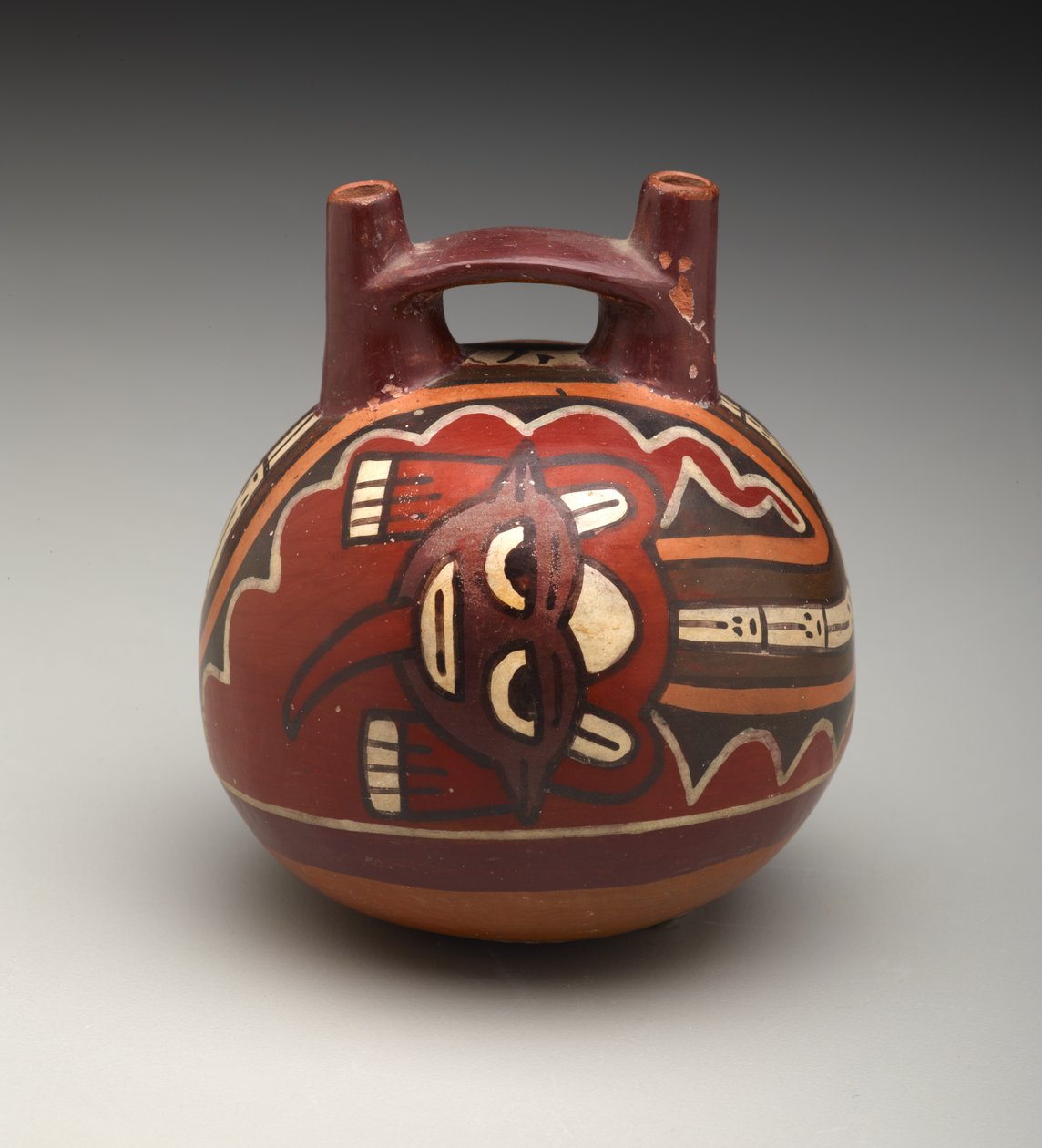 Botella de doble pico: Deidad con cabeza de felino de Culture Nazca