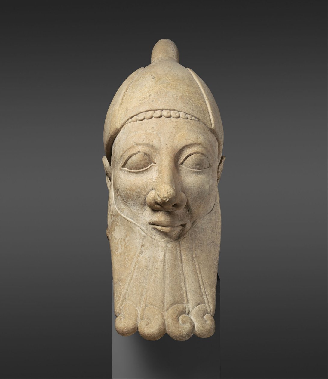 Cabeza de piedra caliza de un hombre barbudo, principios del siglo VI a.C. de Cypriot School
