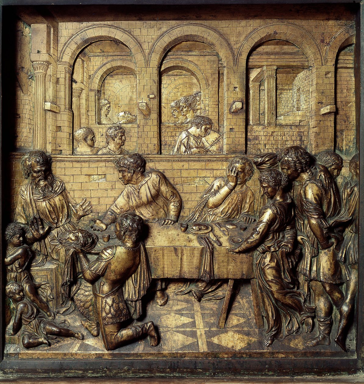 El banquete de Herodes Antipas II (21 a.C.-39 d.C.). Detalle del relieve inferior de la pila bautismal realizada por Donato di Niccolò di Betto Bardi, conocido como Donatello (1386-1466) de Donatello