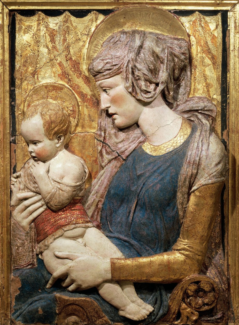 Virgen y Niño, ca 1440, por Donatello (ca 1386-1466), relieve de terracota pintado y dorado de Donatello