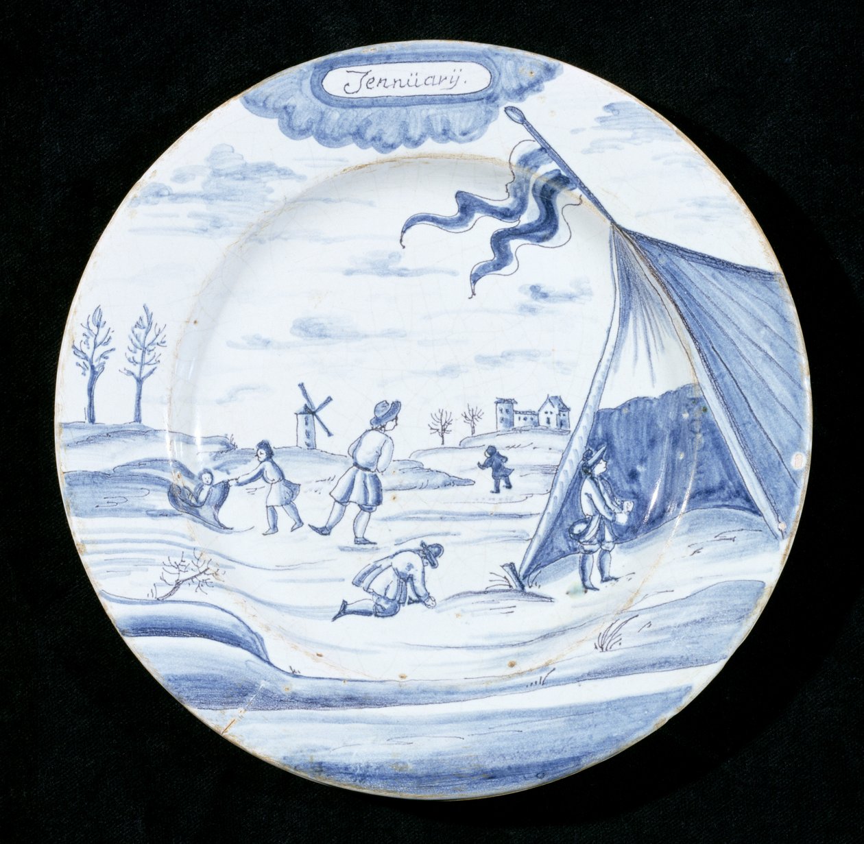 Plato de loza de Delft que representa el mes de enero de Dutch School