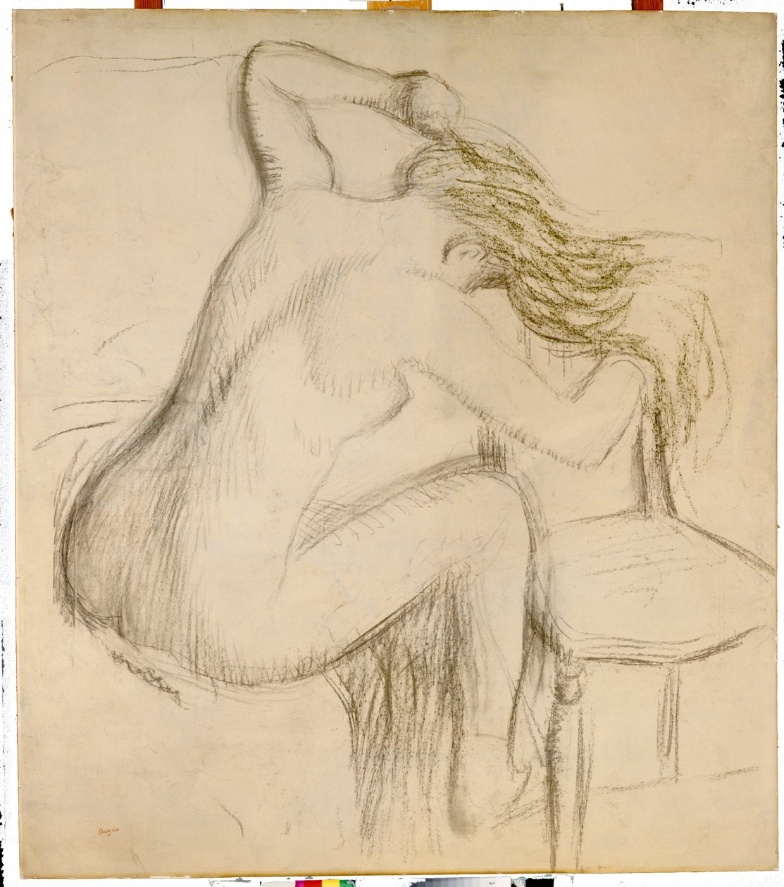 Mujer desnuda sentada peinándose de Edgar Degas