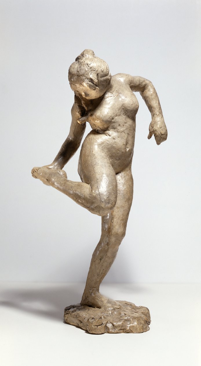 Bailarina mirando la planta de su pie de Edgar Degas