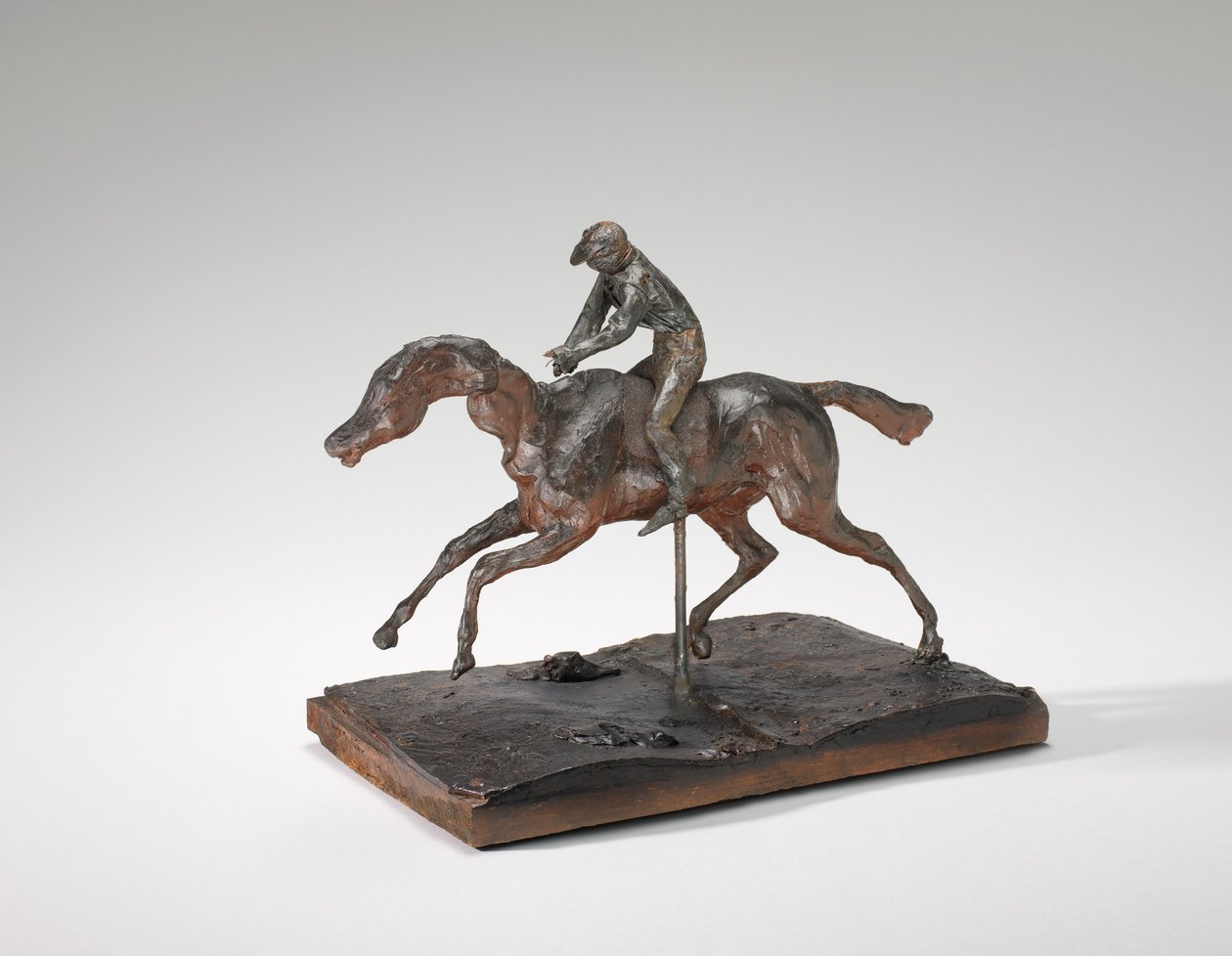 Caballo galopando con el pie derecho, solo el pie trasero izquierdo tocando el suelo de Edgar Degas