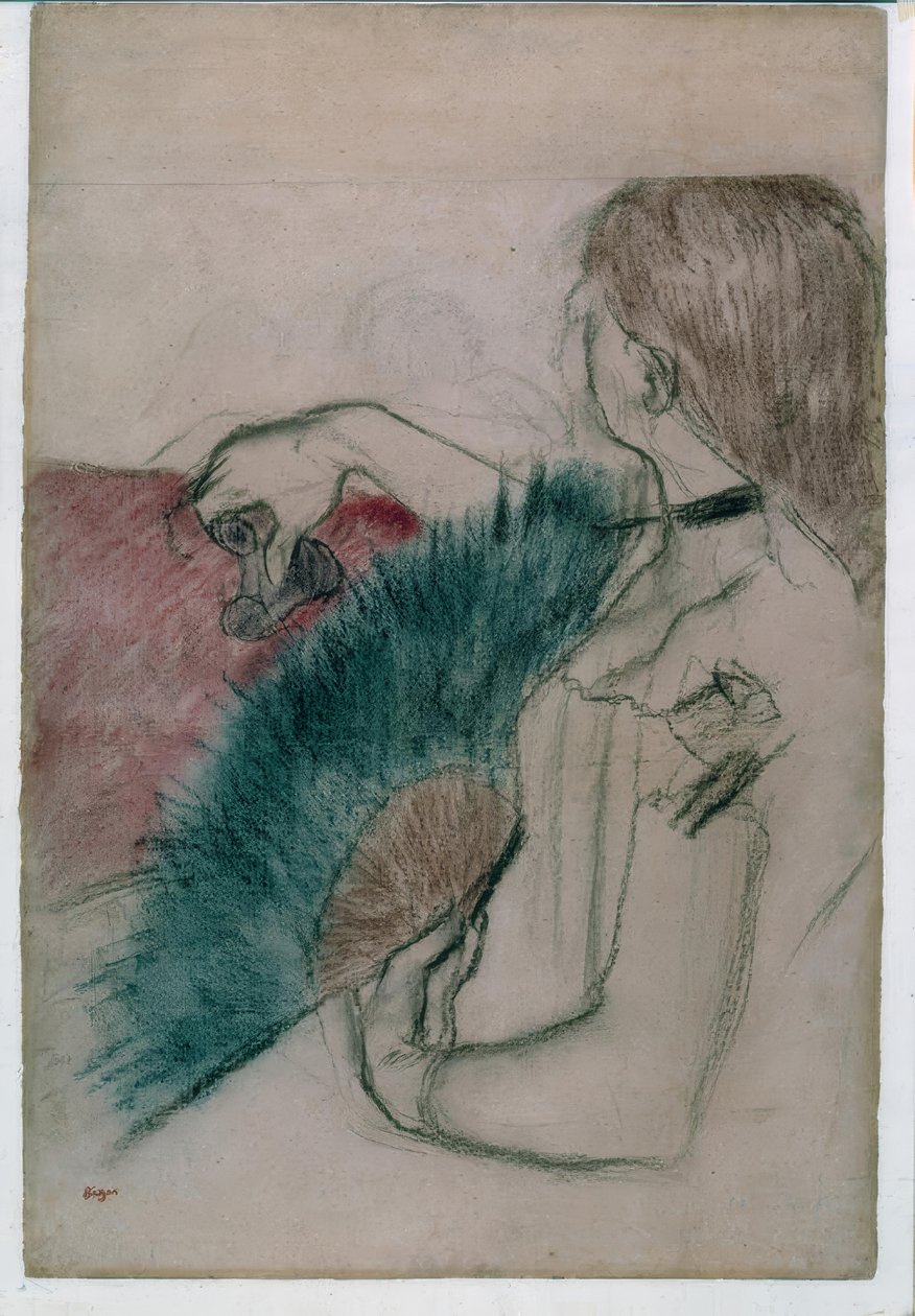 En el teatro: mujer con abanico de Edgar Degas
