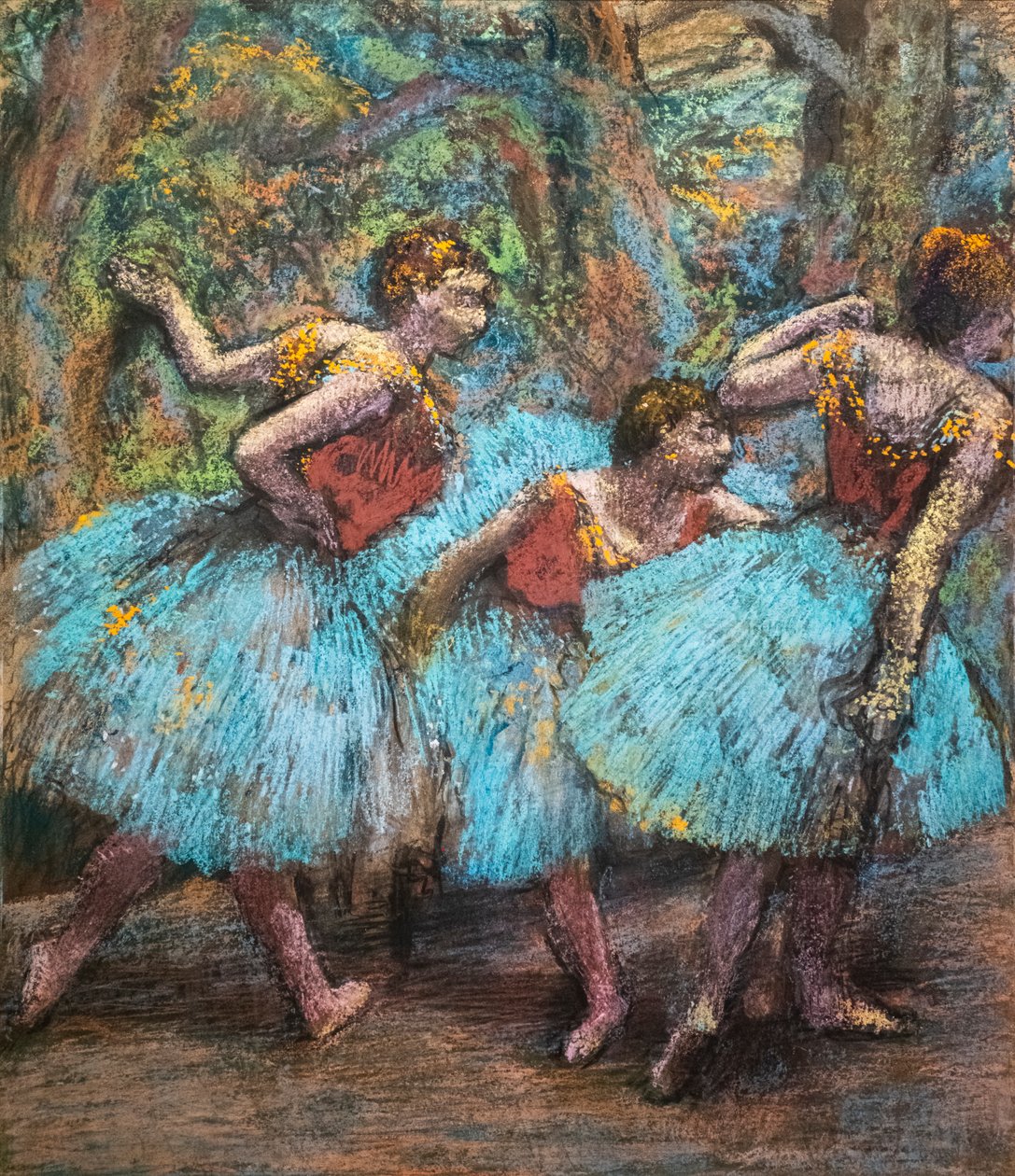 Tres bailarinas (faldas azules, corsés rojos) de Edgar Degas