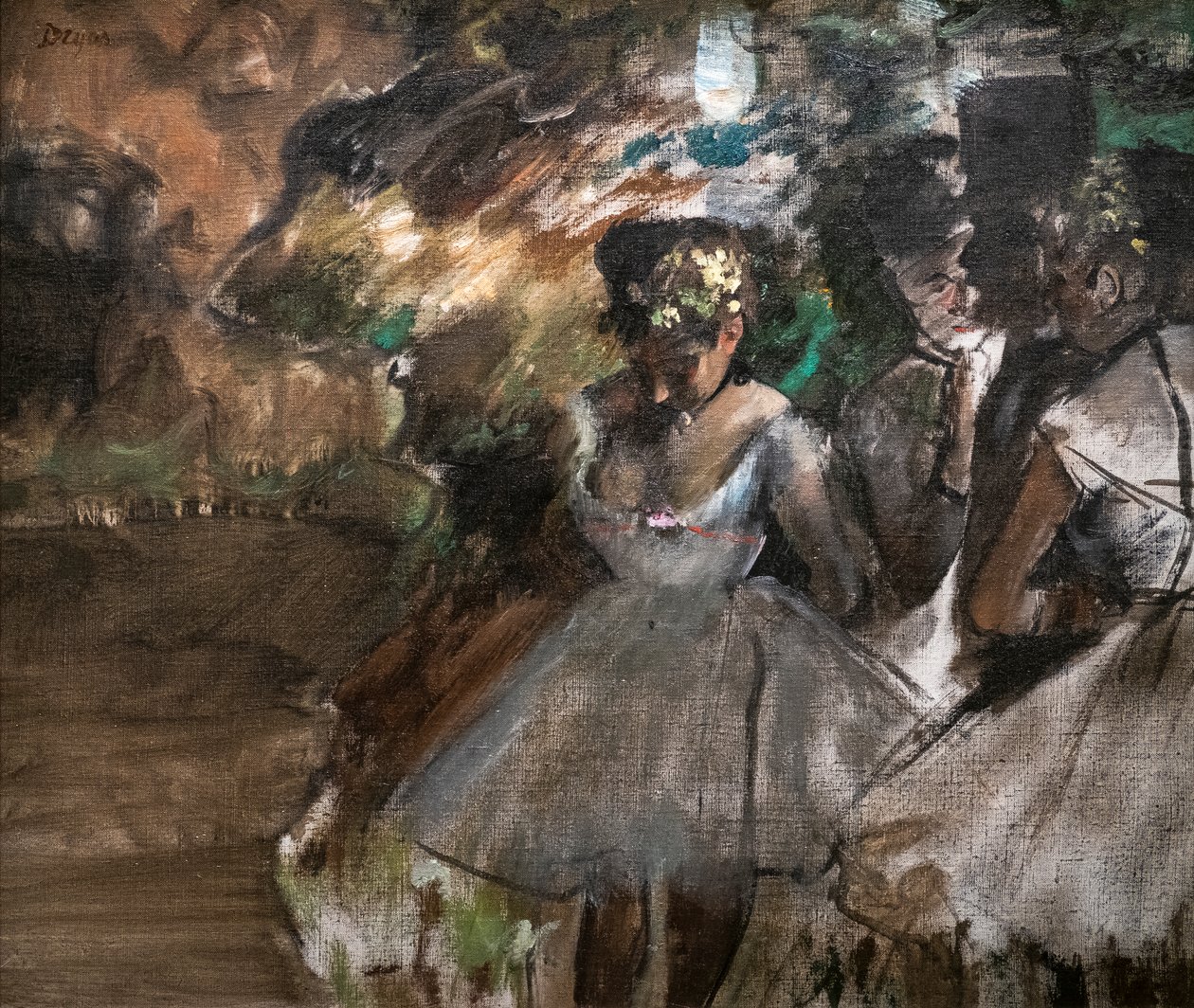 Tres bailarinas detrás de escena de Edgar Degas