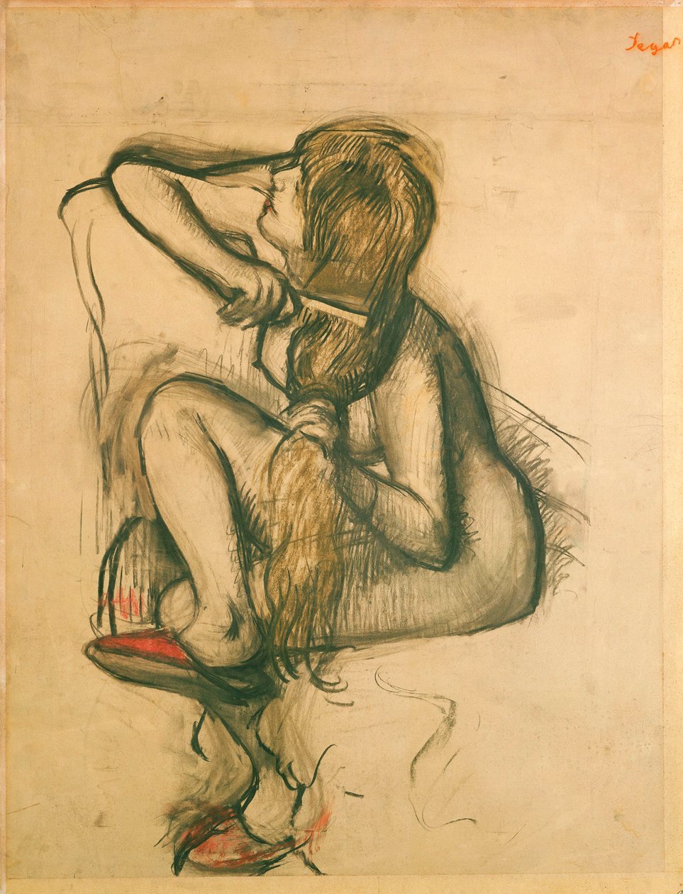 Mujer peinándose de Edgar Degas