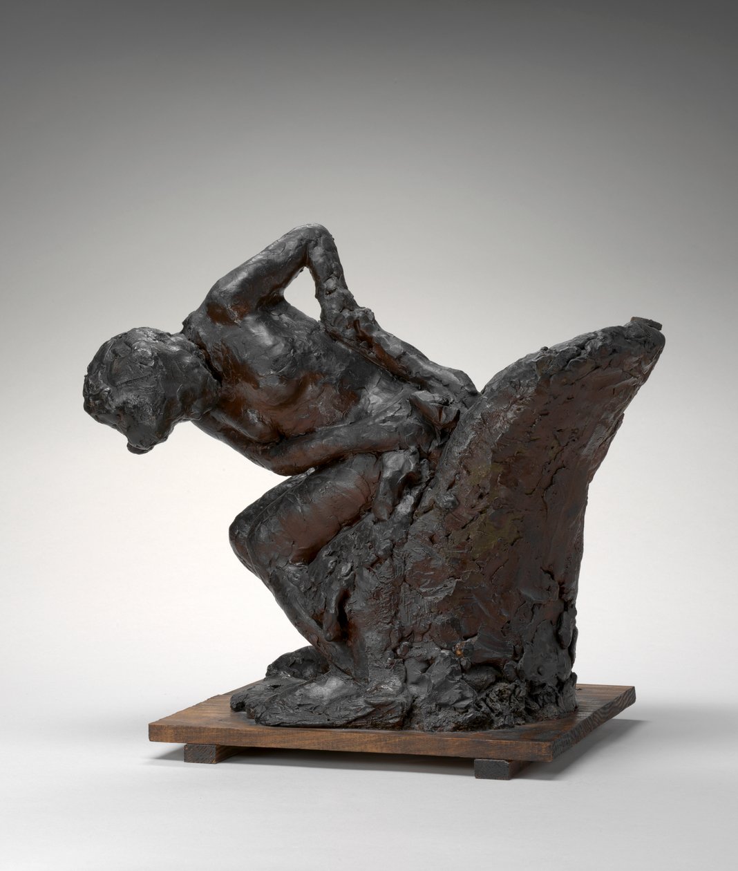 Mujer Sentada, Secándose la Cadera Izquierda de Edgar Degas