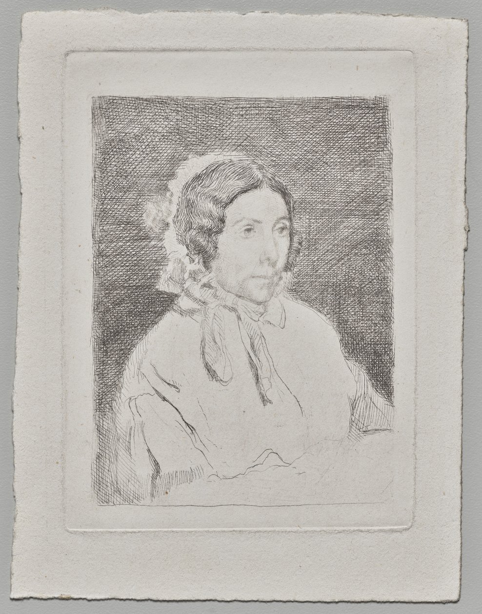 Mujer con gorro con volantes de Edgar Degas
