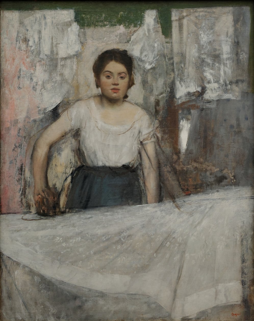 Mujer planchando de Edgar Degas