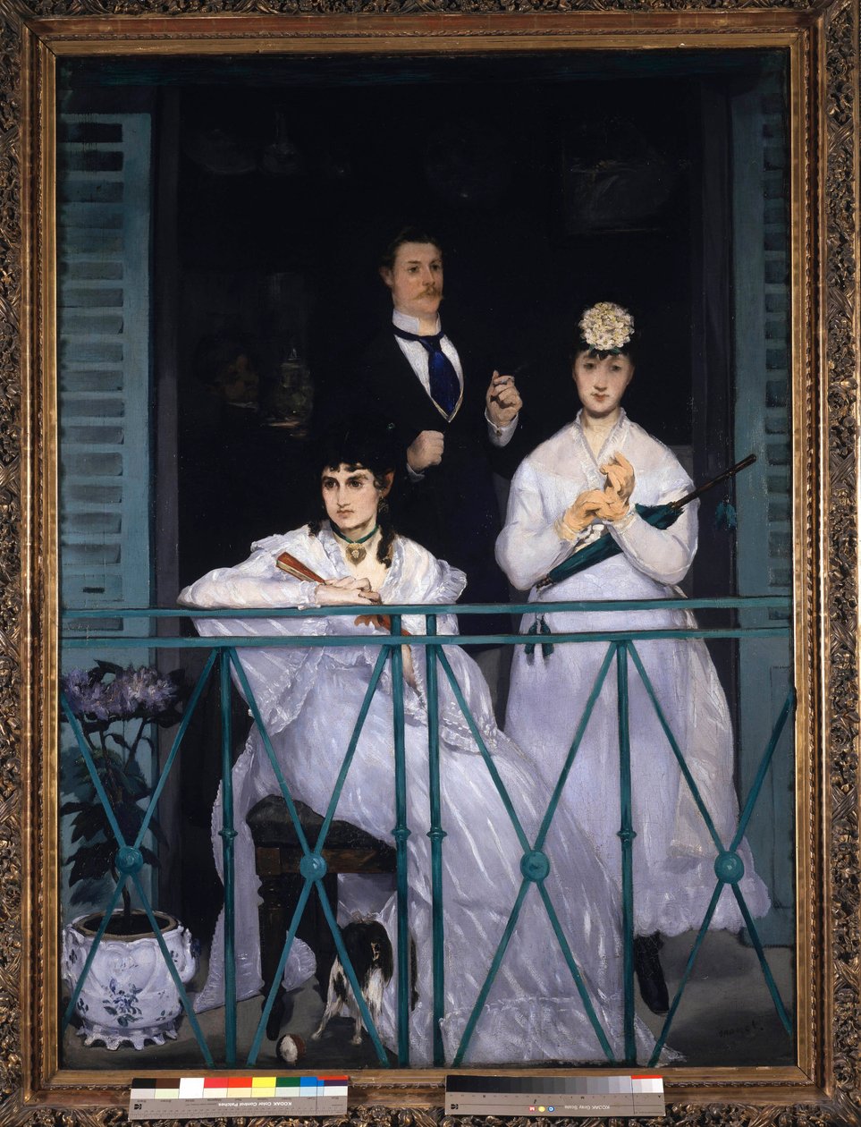 Balcón. Dos jóvenes mujeres con un abanico y una sombrilla y un hombre con corbata. Retrato de Berthe Morisot (1841-1895), pintora francesa, Fanny Claus (1846-1877), violinista, Antoine Guillemet (1841-1918) paisajista y al fondo Leon Leenhoff. Pintura de  de Édouard Manet