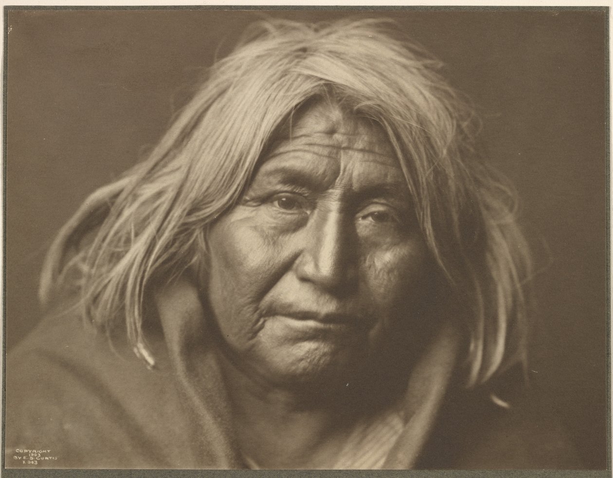 [Un apache] de Edward S. Curtis